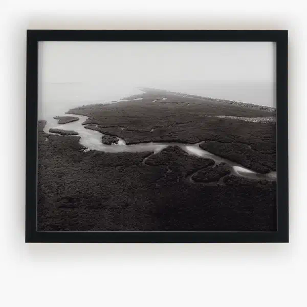 An ocean in between the waves — black frame overhead
