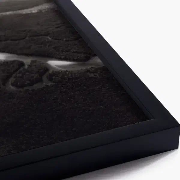 An ocean in between the waves — black frame detail