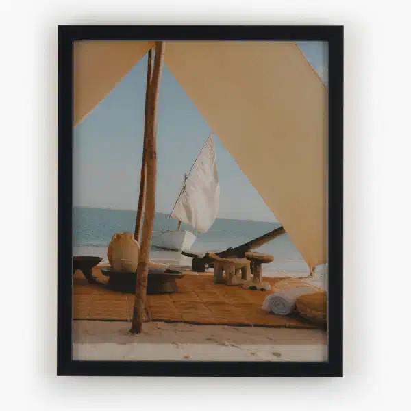 I walk the shore — black frame overhead